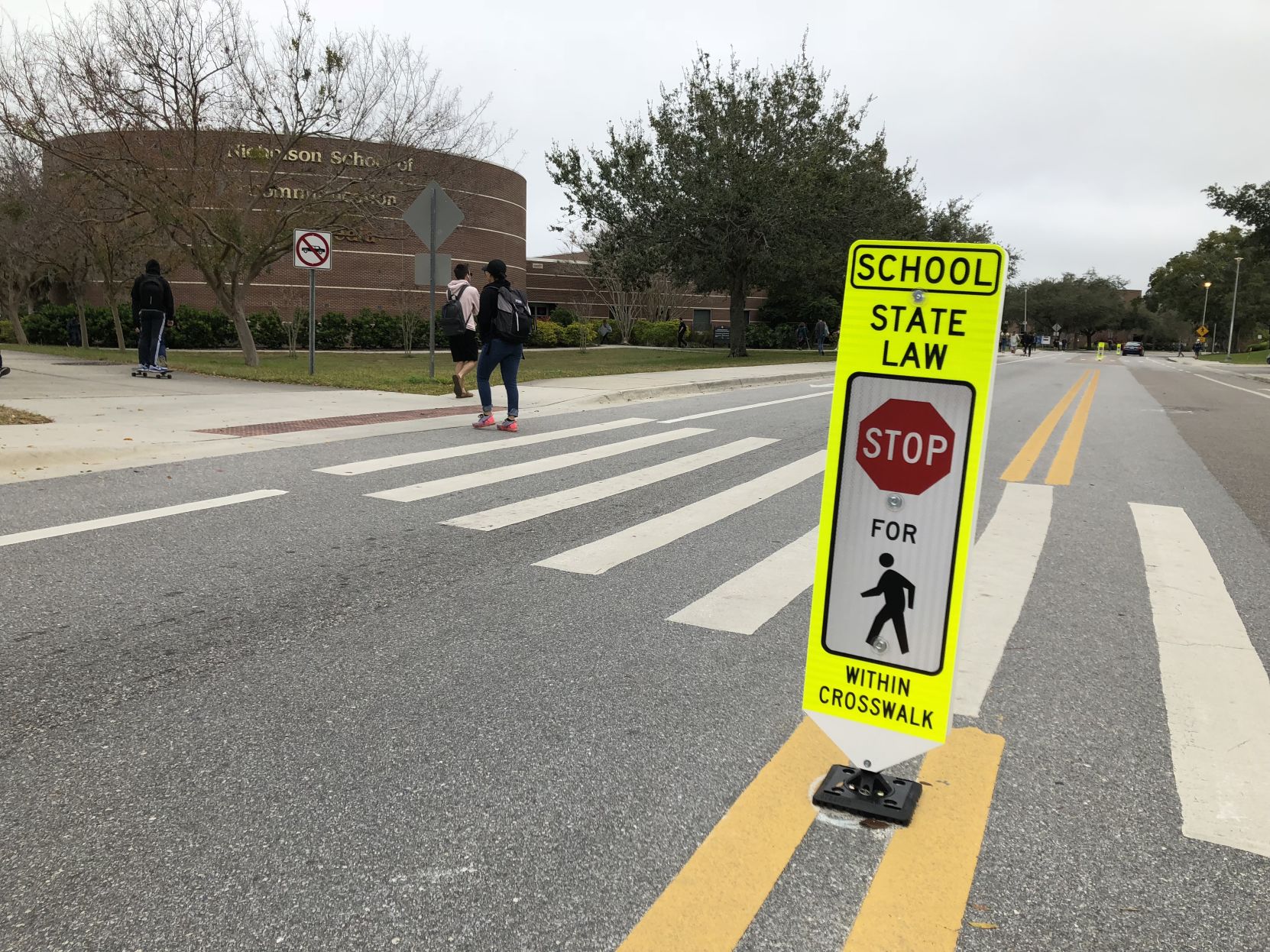 UCFPD officers at crosswalks article photo